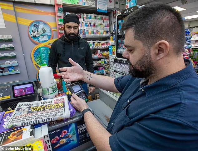Outrage as First UK Man Receives Microchip Implant to make payments [photos]