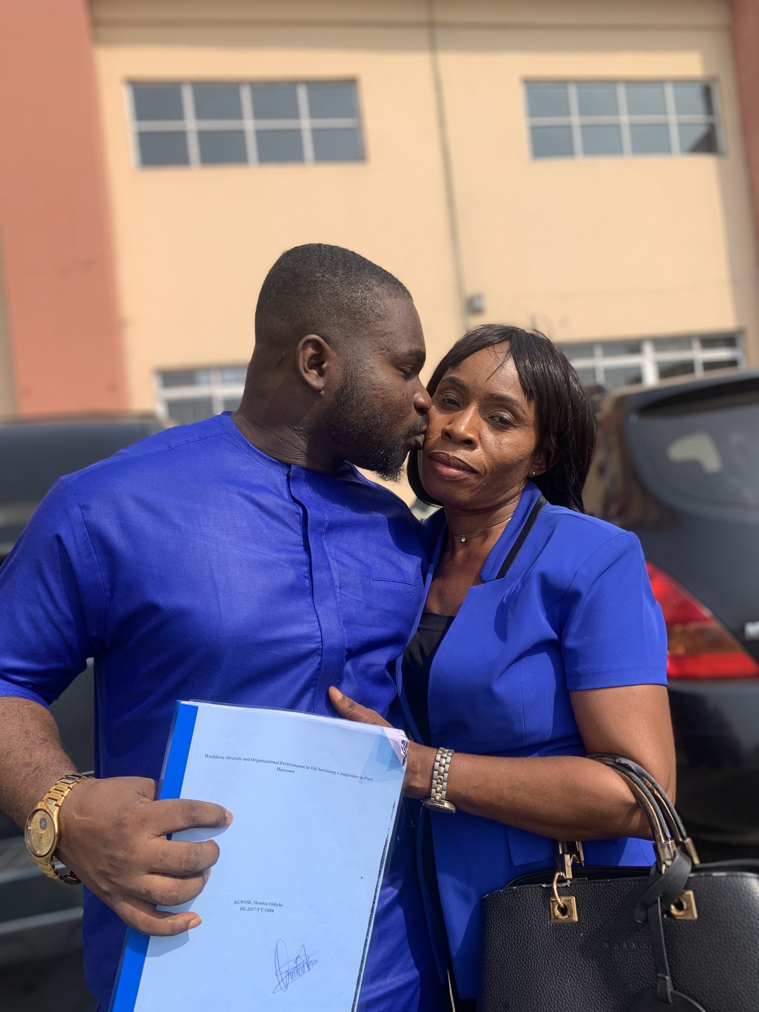 Man celebrates mom as she graduates 20 years after dropping out to send him to school [photos]