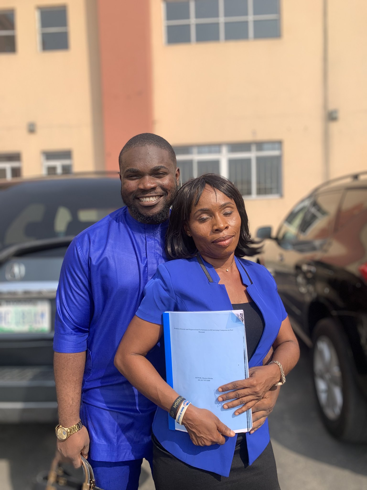 Man celebrates mom as she graduates 20 years after dropping out to send him to school [photos]