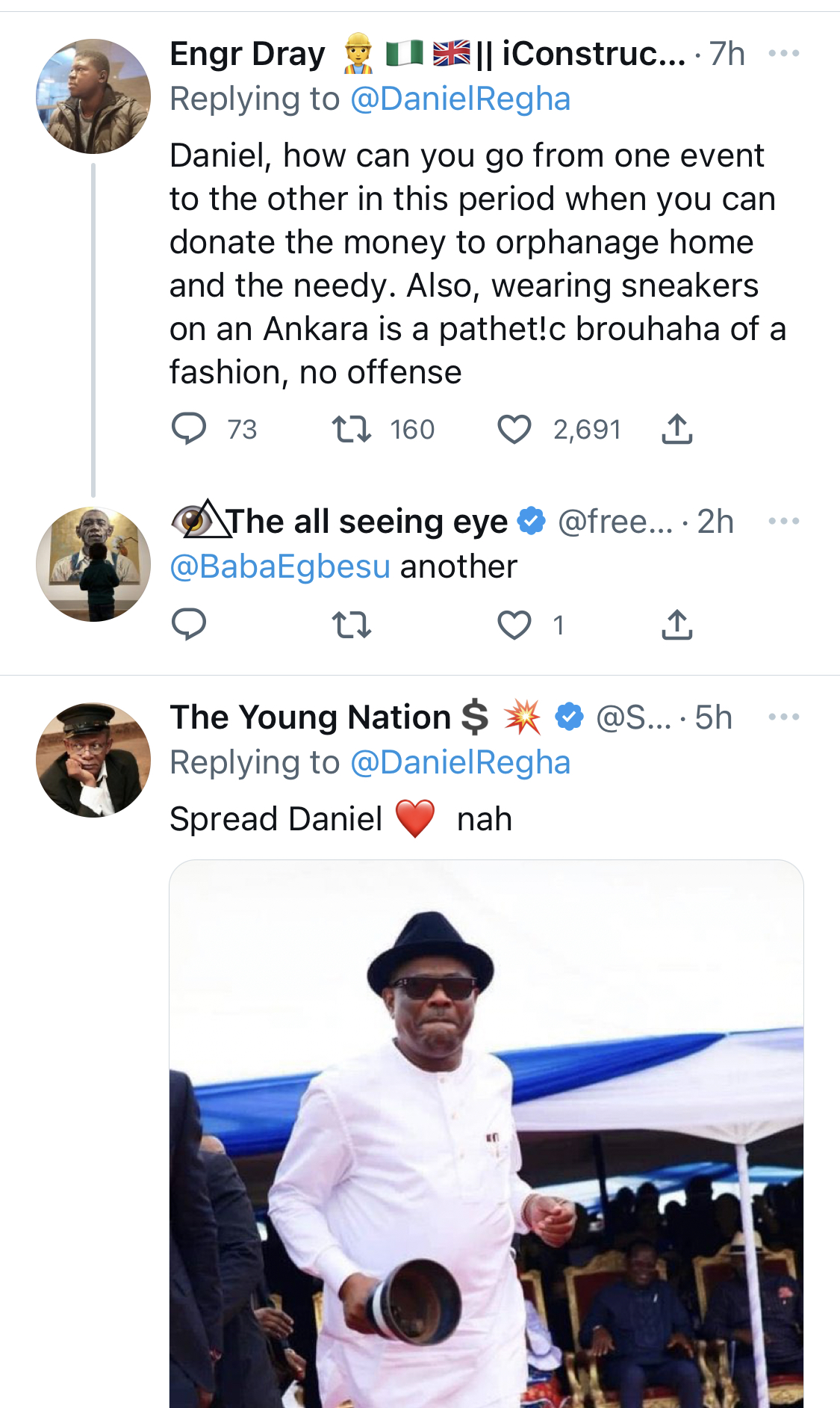 You look like a village champion - Nigerians blast Twitter critic Daniel Regha over his outfit [photos]