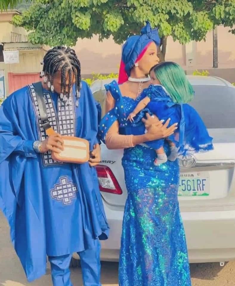 Young Nigerian Couple Celebrate new year in style as little daughter rocks green bone straight wig [photos]