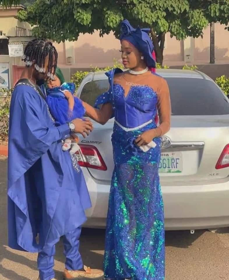 Young Nigerian Couple Celebrate new year in style as little daughter rocks green bone straight wig [photos]