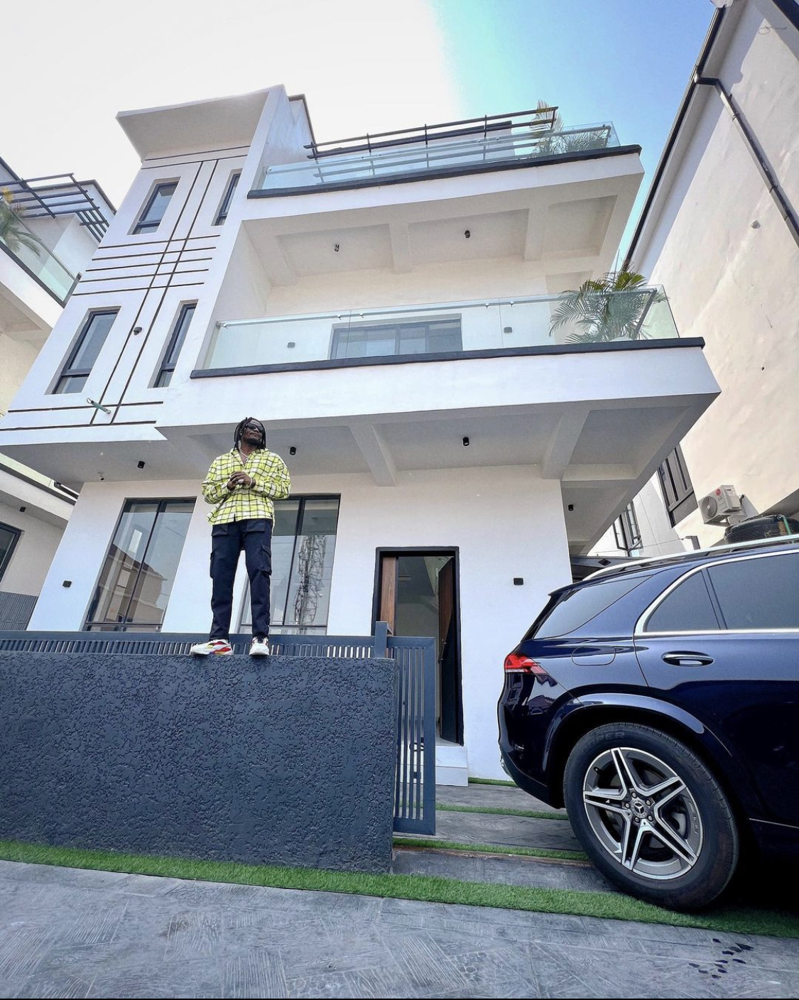 Singer Pheelz splashes millions on new car and house [photos]