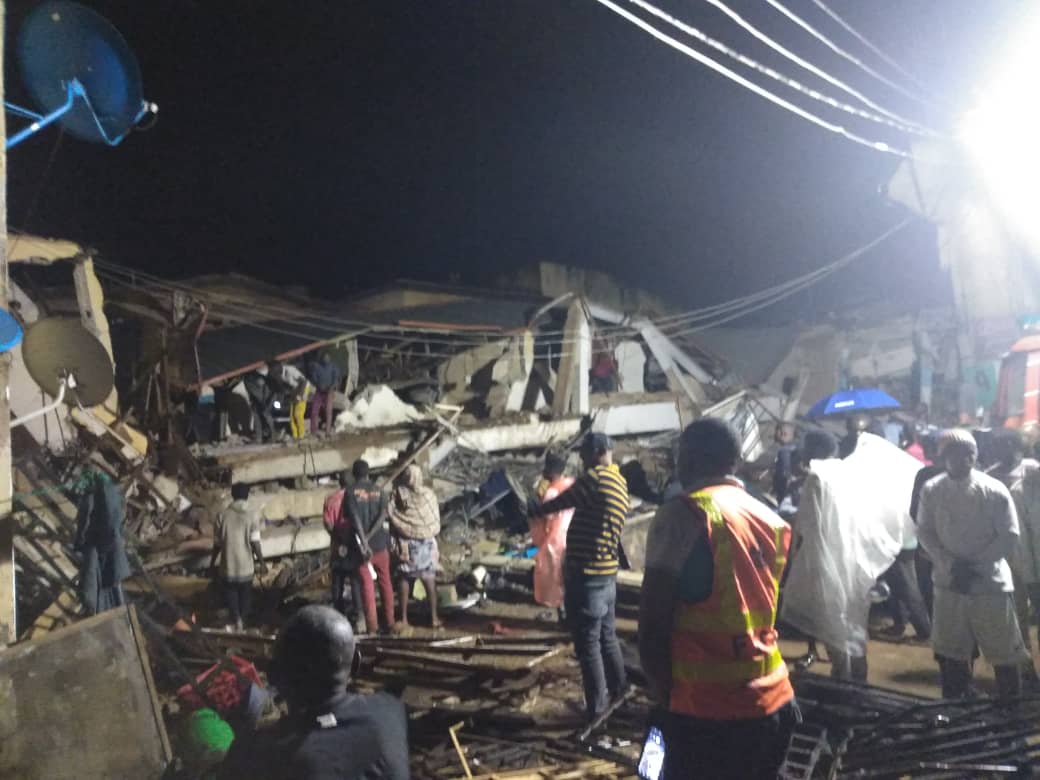 Many Feared dead, others trapped as multi storey building collapses in Abuja [photos]