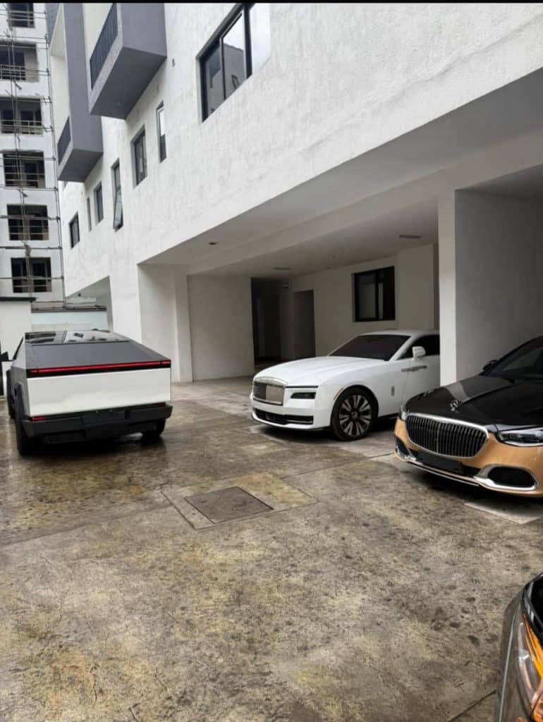picture of davido's car garage with his rolls royce, maybach and cyber truck parked