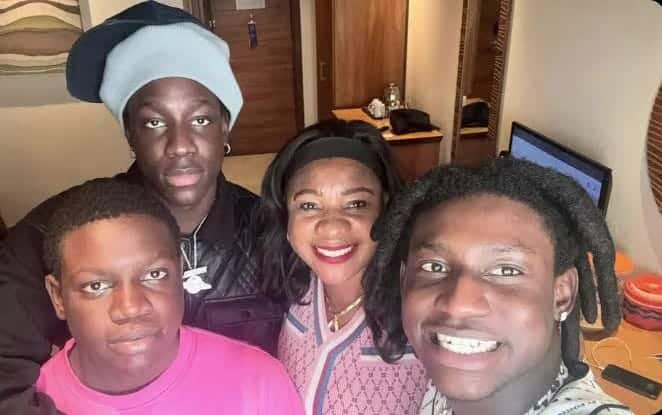 a pictue of Famous Pluto, Shallipopi and Zerry DL with their Mother