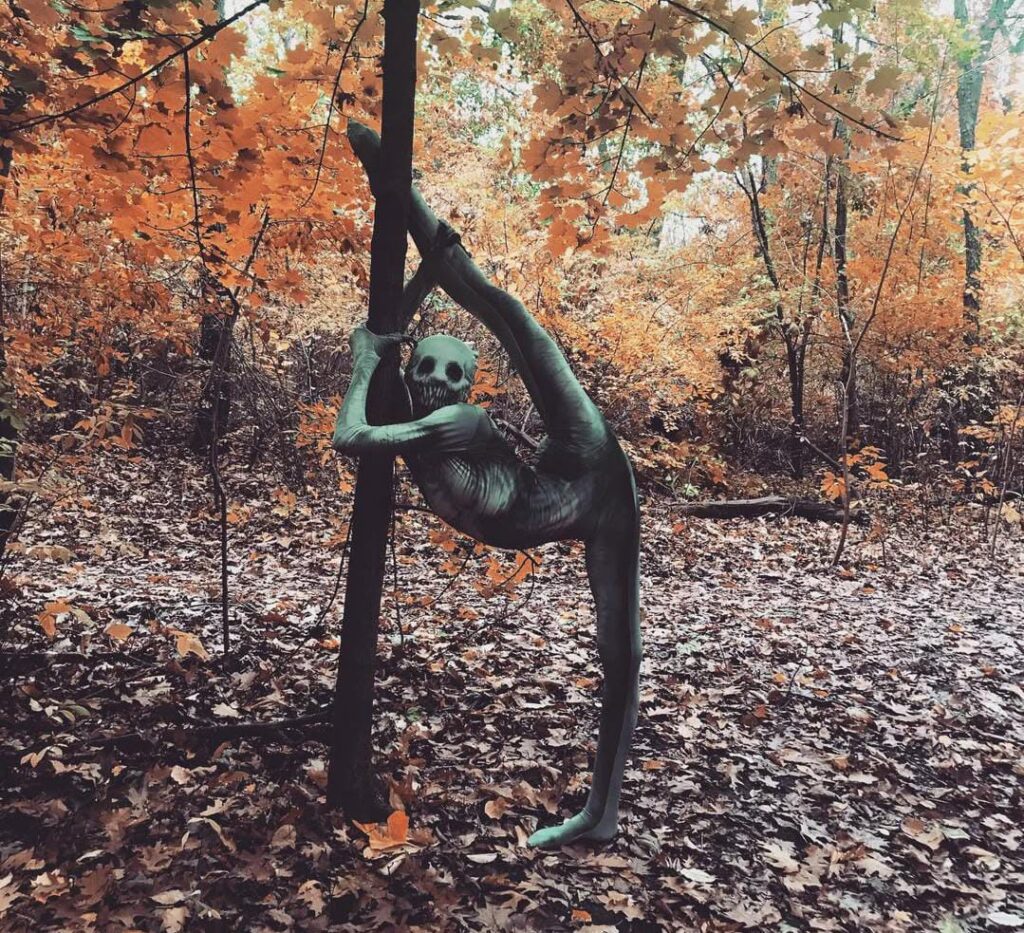 a photo of preppyclaws in her in skelenton bodysuit